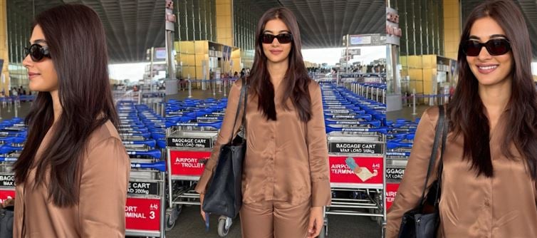 Sunglasses On, Confidence Maxed: Pooja Hegde Serves Airport Glam in a Silky Brown Power Suit