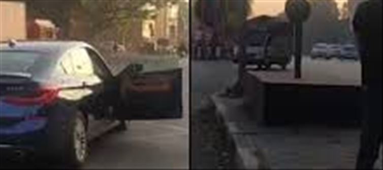 Got down from BMW and started urinating in the middle of the road!