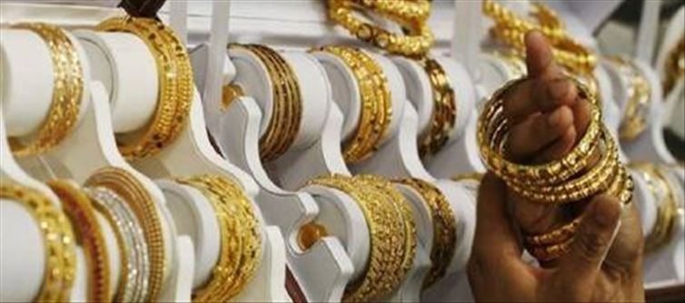 తగ్గిన బంగారం.. కొండెక్కిన వెండి!