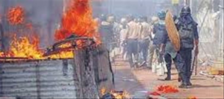 Why do communal riots erupt?