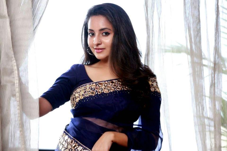 Actress Bhama Stills In Black Half Saree