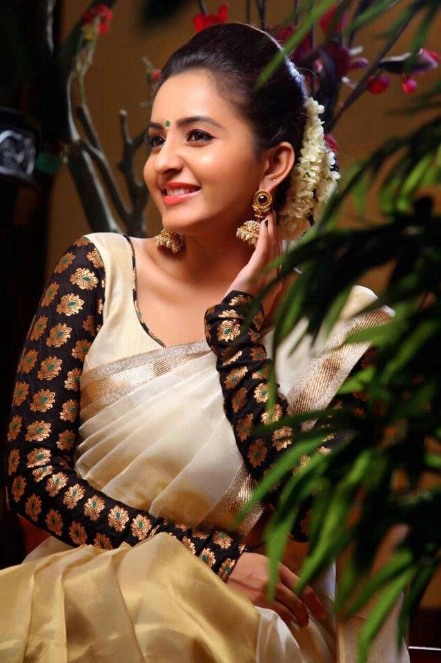 Actress Bhama Stills In Black Half Saree