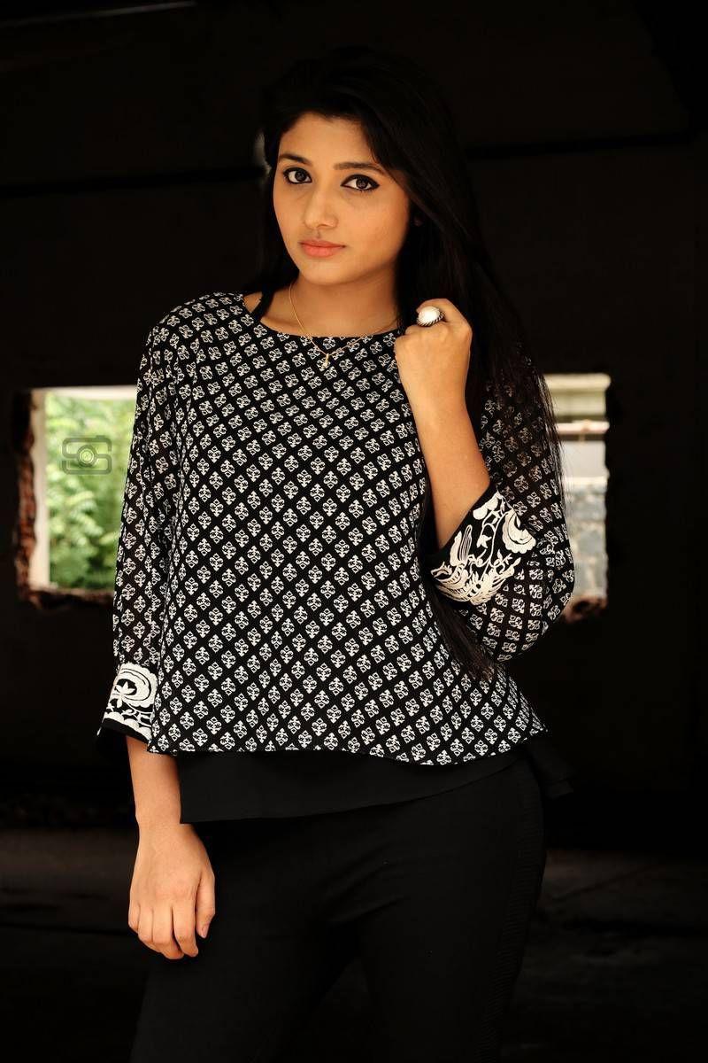 Aditi Menon Photoshoot Stills in Black Top