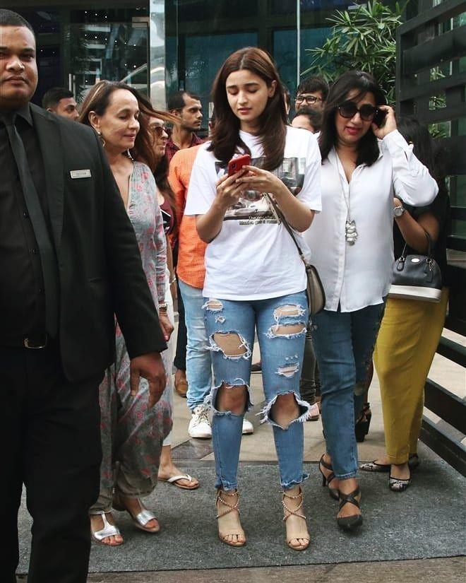 Alia Bhatt spotted outside her residence with security guards