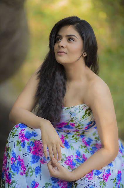 Anchor Sreemukhi Photoshoot Stills In Blue Floral Print Dress