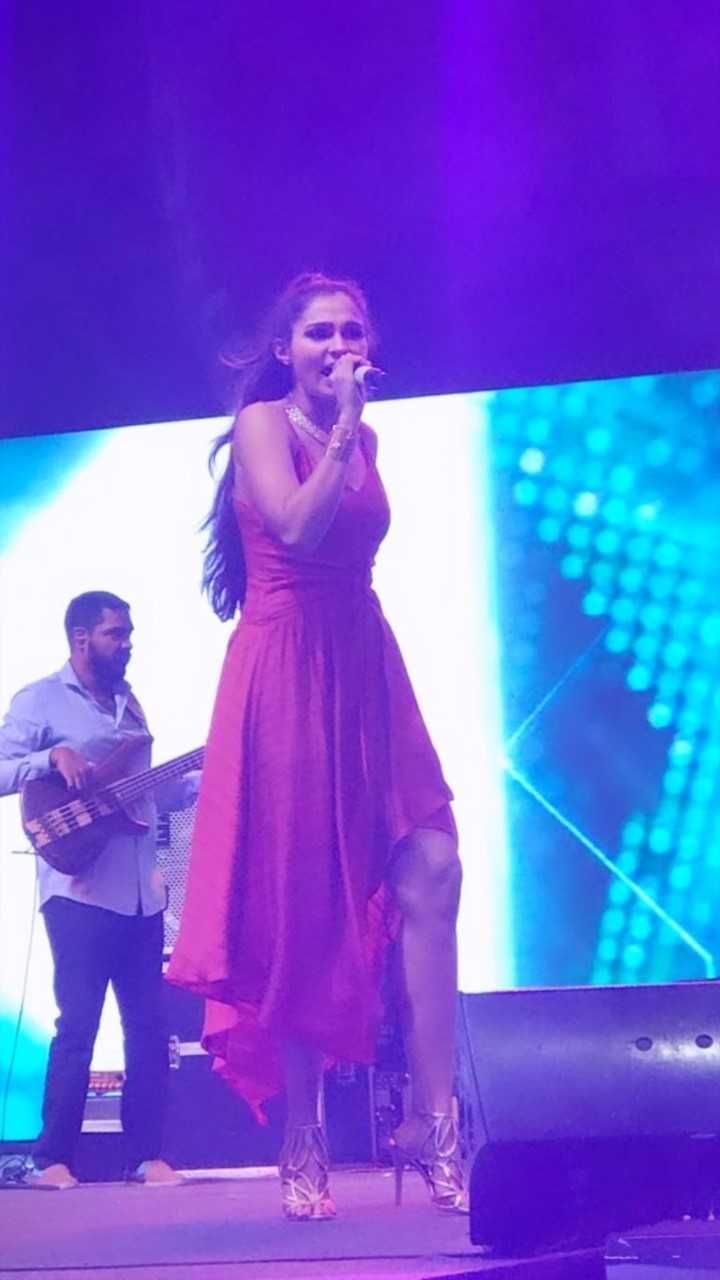 Andrea Jeremiah Performing Photos