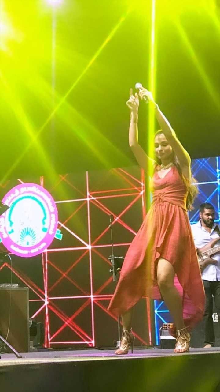 Andrea Jeremiah Performing Photos