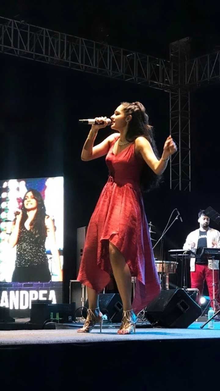 Andrea Jeremiah Performing Photos