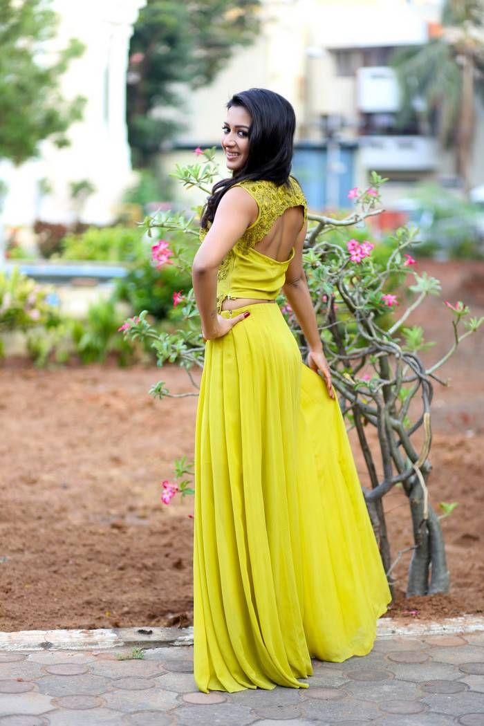 Catherine Tresa Stills In Lemon Green Dress