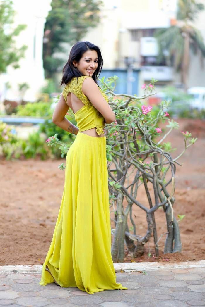 Catherine Tresa Stills In Lemon Green Dress