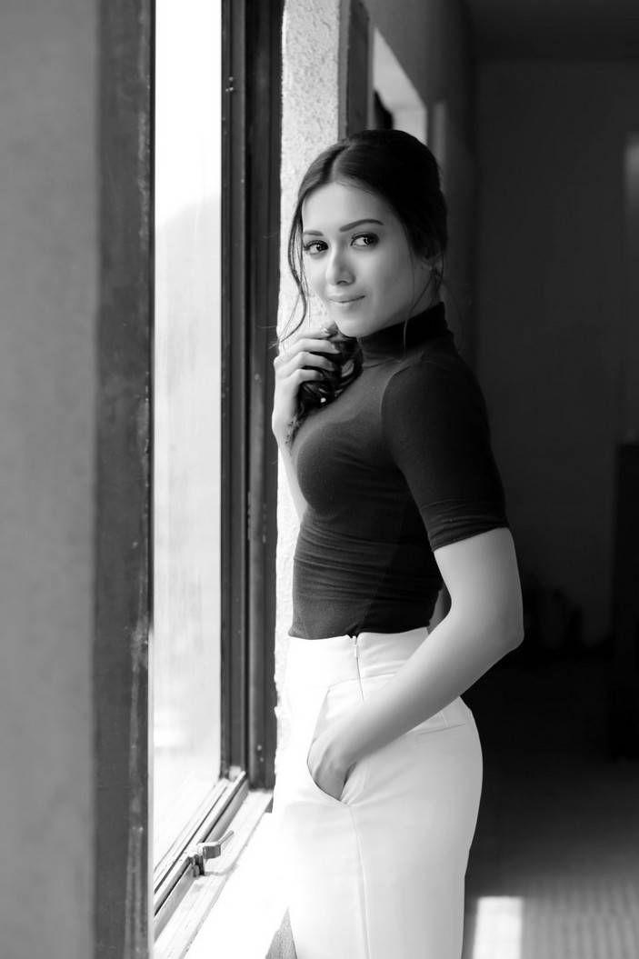 Catherine Tresa Stills in Black Top & White Pant