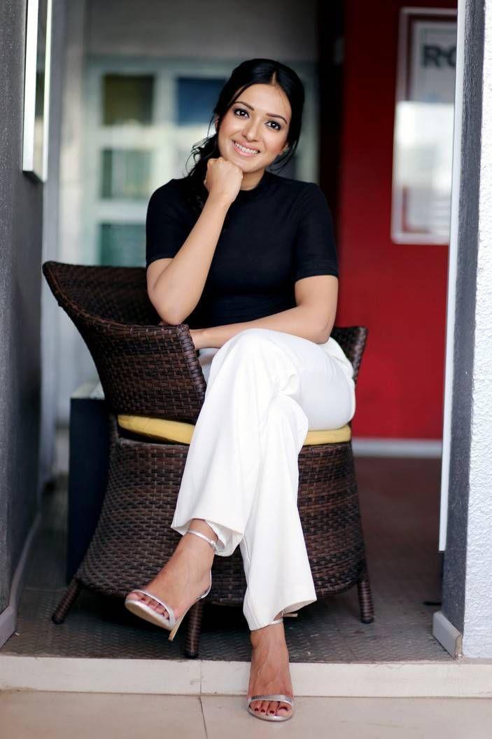 Catherine Tresa Stills in Black Top & White Pant