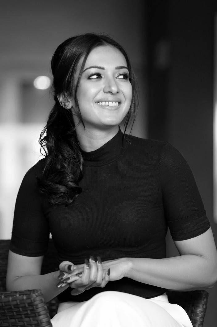 Catherine Tresa Stills in Black Top & White Pant