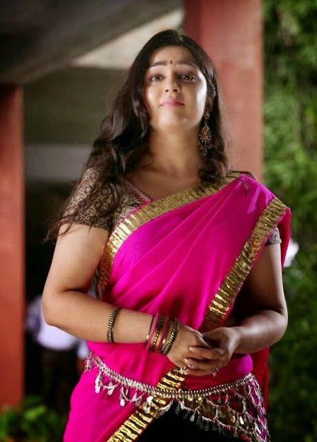 Cute And Beautiful Saree Stills Of Heroine Charmi Kaur
