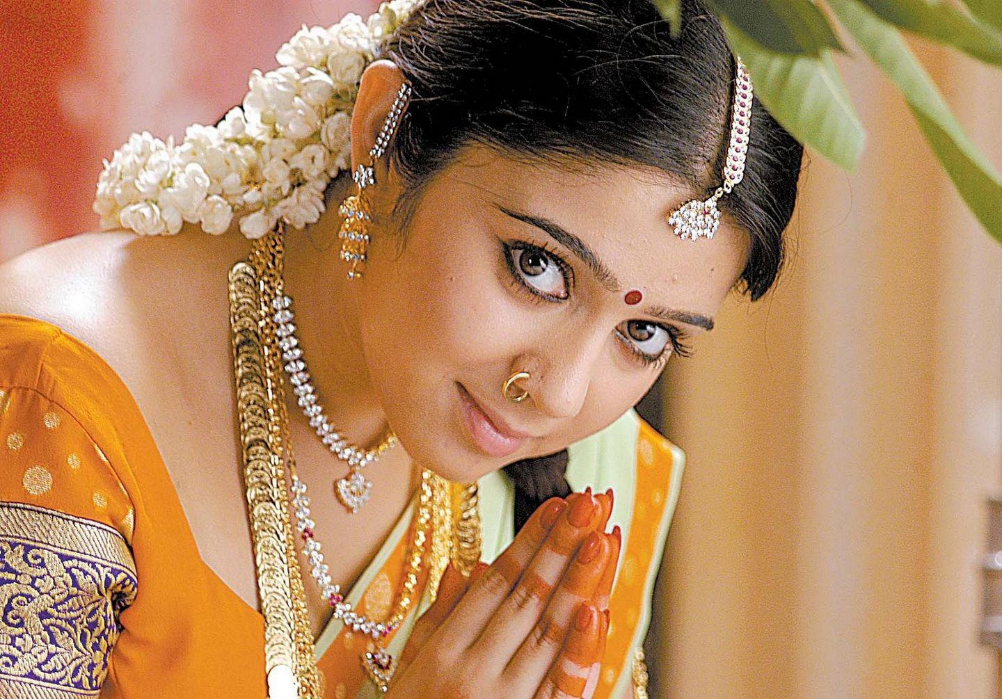 Cute And Beautiful Saree Stills Of Heroine Charmi Kaur