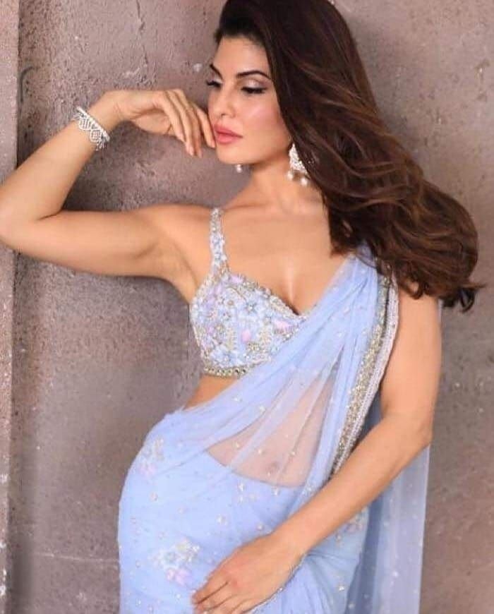Jacqueline Fernandez shows her Hotness in Saree Photoshoot