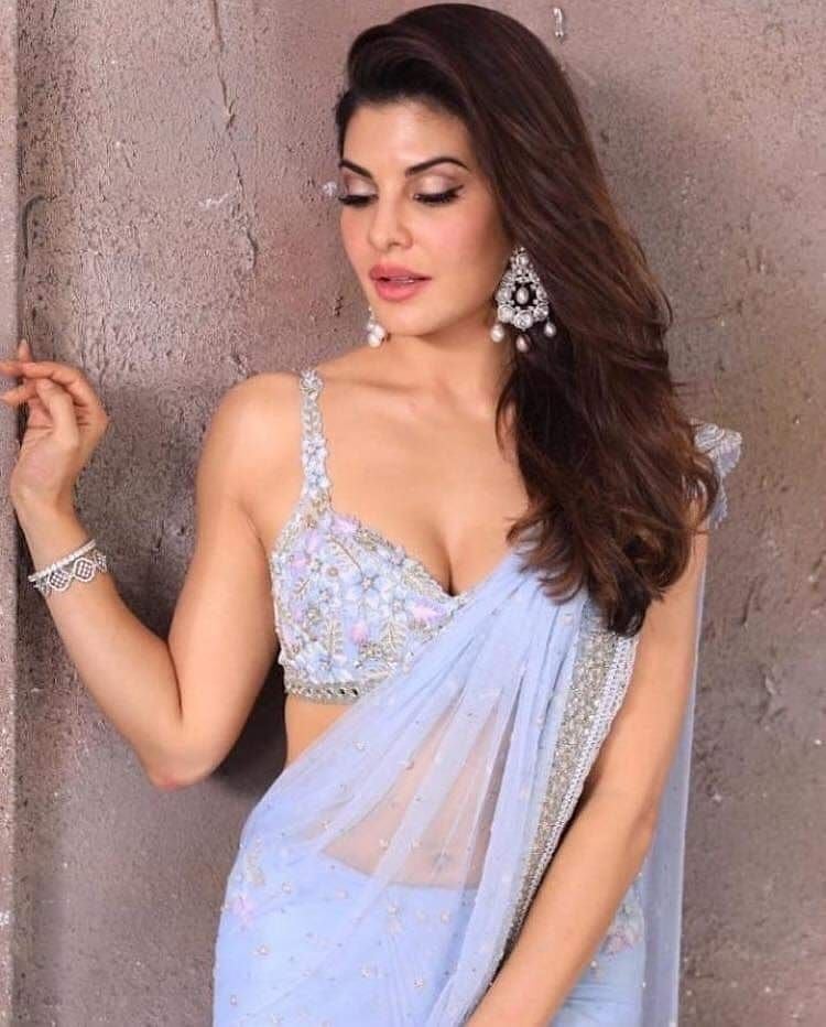 Jacqueline Fernandez shows her Hotness in Saree Photoshoot