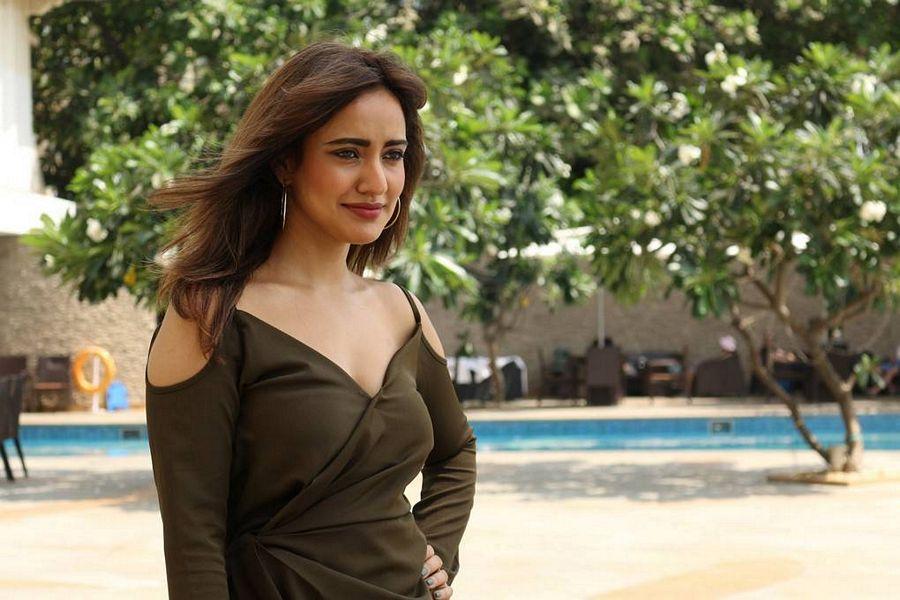 Neha Sharma Stills At Mobile App Launch