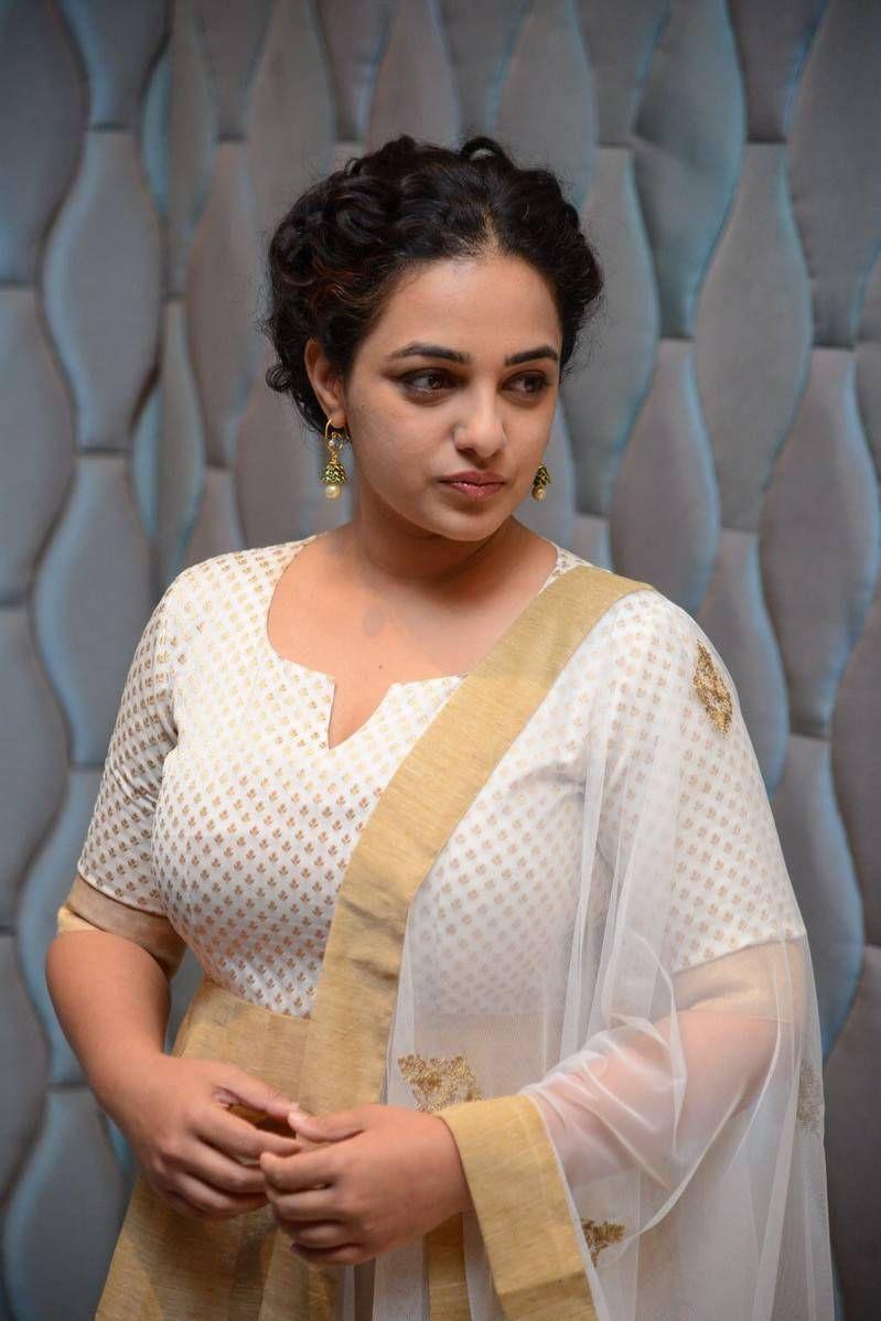 Nithya Menen Stills At 100 Days Of Love Movie Press Meet