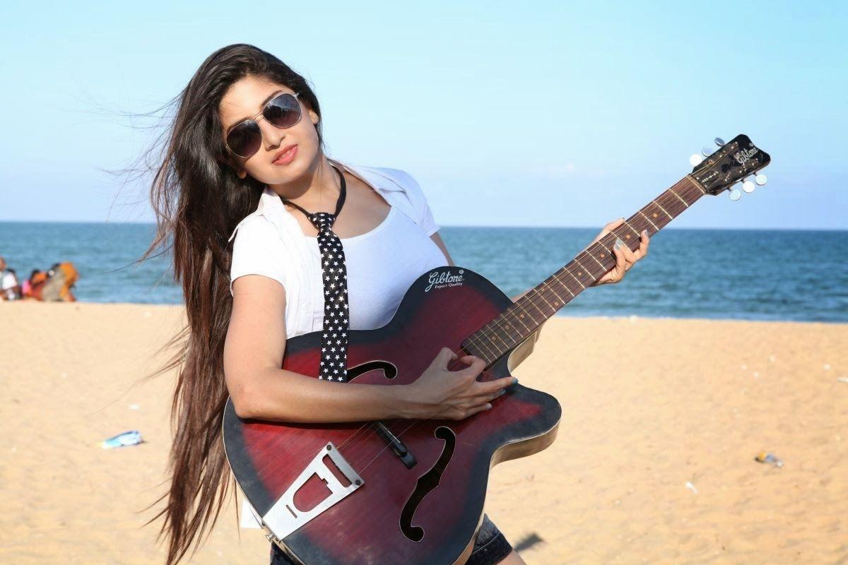 Poonam Kaur Latest Beach Photoshoot Stills