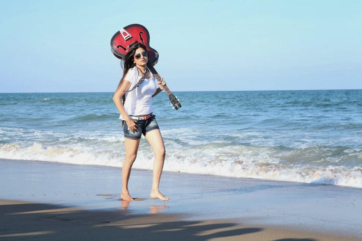 Poonam Kaur Latest Beach Photoshoot Stills