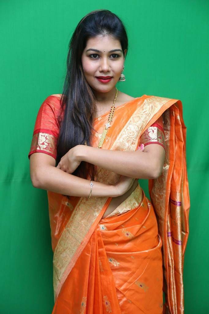 Rachana Smith Photo Shoot Stills In Traditional Orange Saree