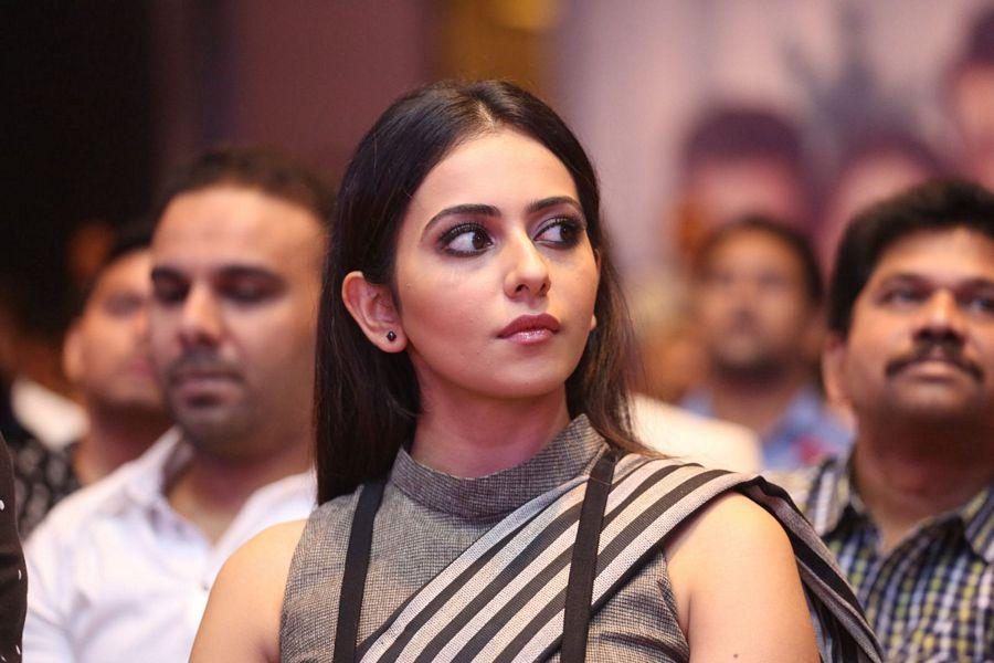 Rakul Preet Singh Navel Exposing Stills At Abhinetri Audio