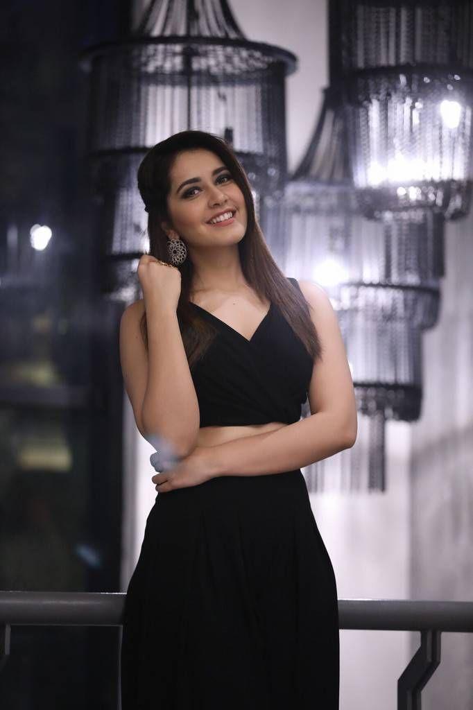 Rashi Khanna Photo Shoot Stills In Black Sleeveless Top