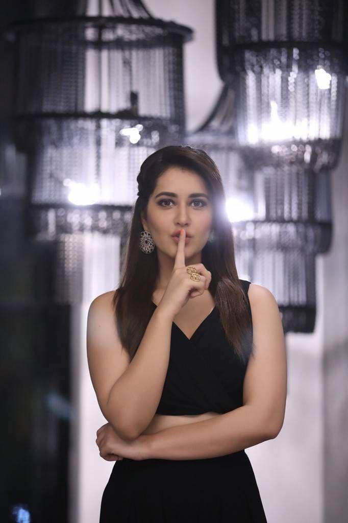 Rashi Khanna Photo Shoot Stills In Black Sleeveless Top