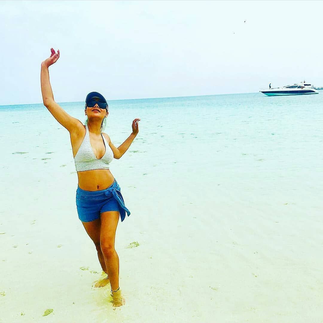 Sara Khan hot stills in Bikini on beach side
