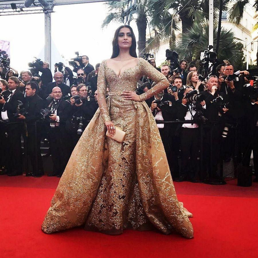 Sonam Kapoor hot dazzles in gold at the red carpet Cannes 2017 Photos