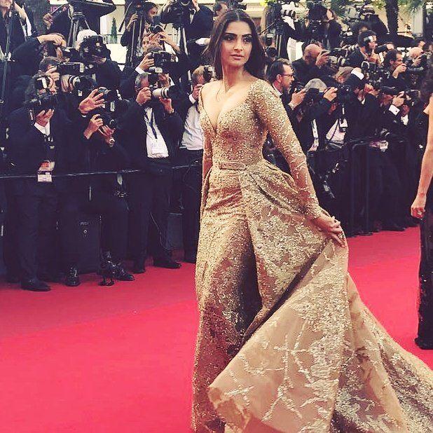 Sonam Kapoor hot dazzles in gold at the red carpet Cannes 2017 Photos