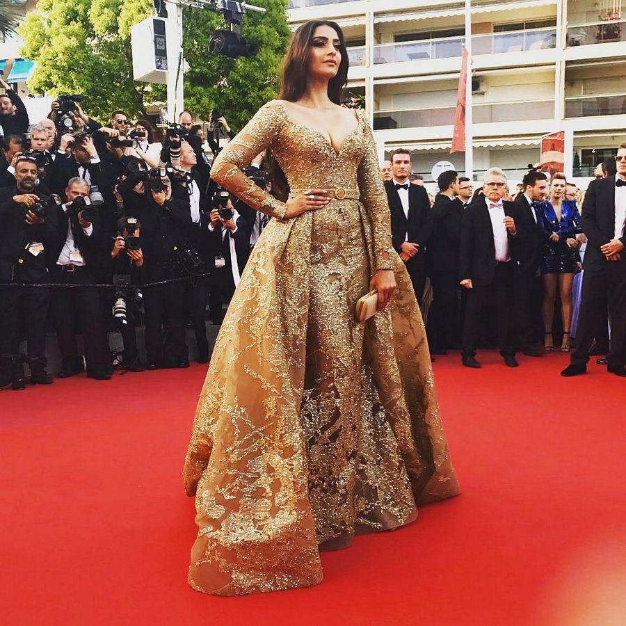 Sonam Kapoor hot dazzles in gold at the red carpet Cannes 2017 Photos