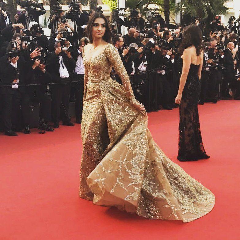 Sonam Kapoor hot dazzles in gold at the red carpet Cannes 2017 Photos