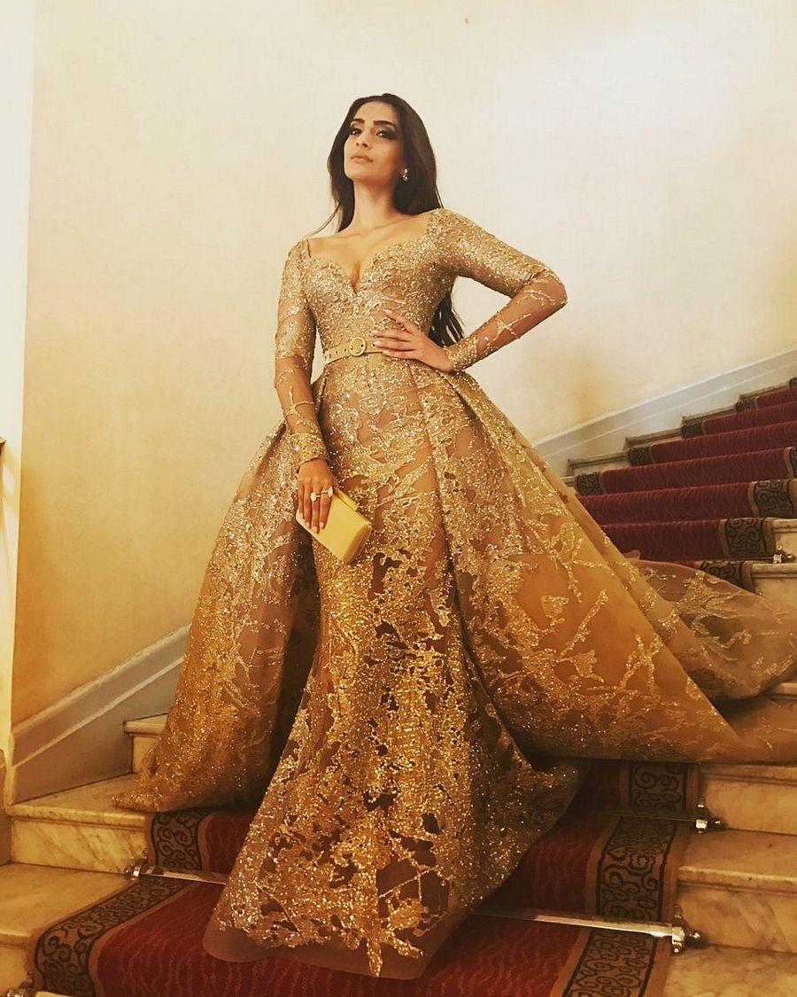 Sonam Kapoor hot dazzles in gold at the red carpet Cannes 2017 Photos