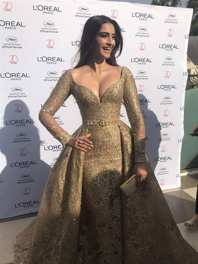 Sonam Kapoor hot dazzles in gold at the red carpet Cannes 2017 Photos
