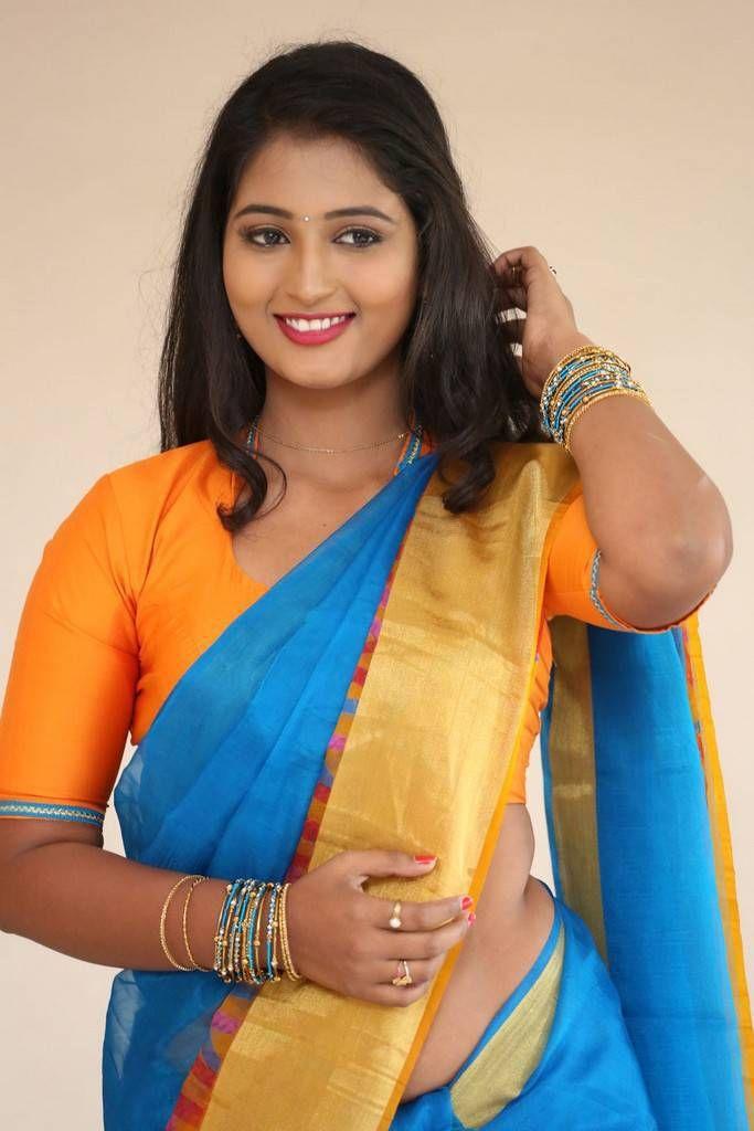 Teja Reddy Photo Shoot Stills In Blue Saree With Golden Yellow Border