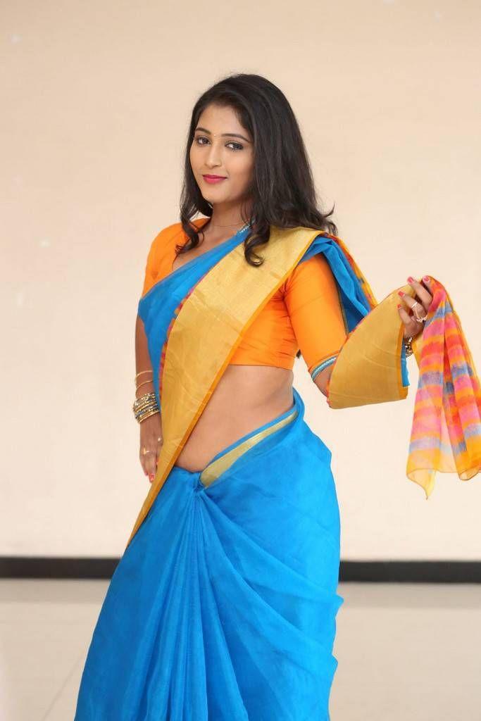 Teja Reddy Photo Shoot Stills In Blue Saree With Golden Yellow Border