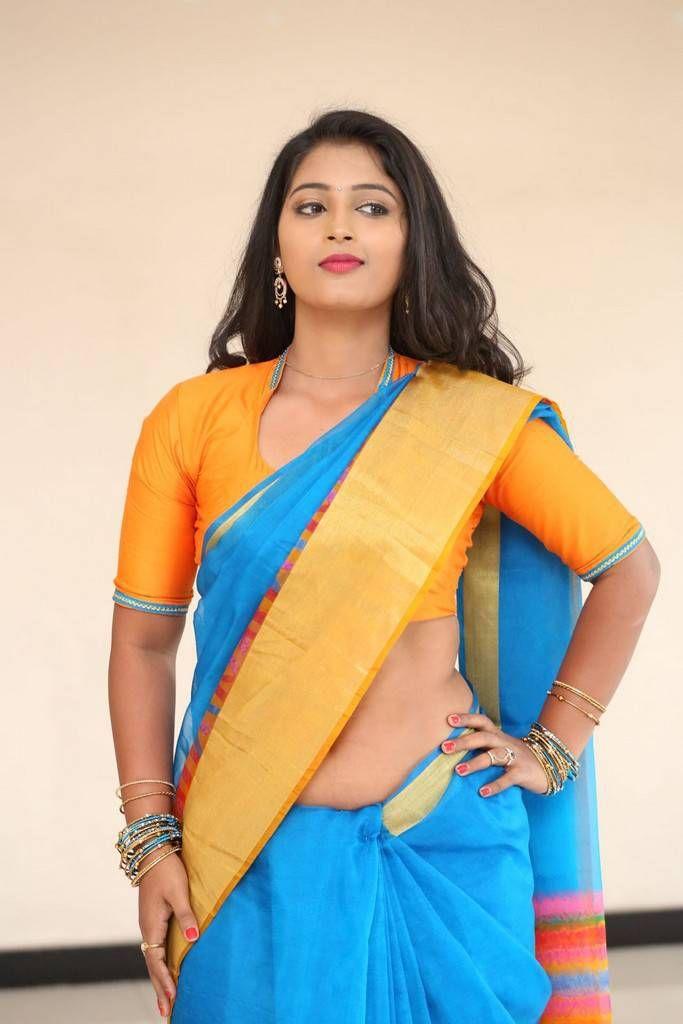 Teja Reddy Photo Shoot Stills In Blue Saree With Golden Yellow Border