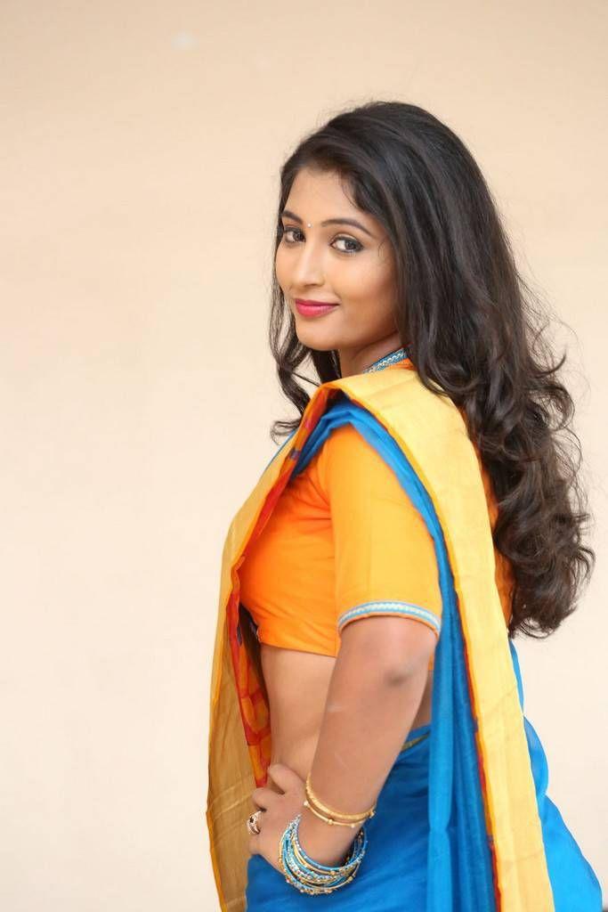 Teja Reddy Photo Shoot Stills In Blue Saree With Golden Yellow Border