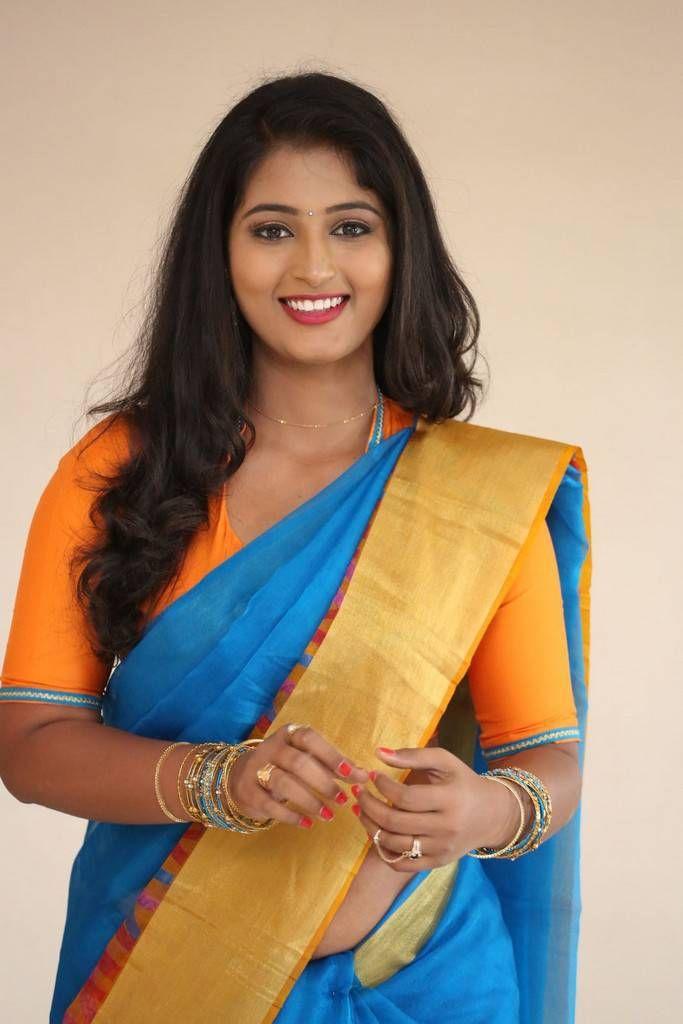 Teja Reddy Photo Shoot Stills In Blue Saree With Golden Yellow Border