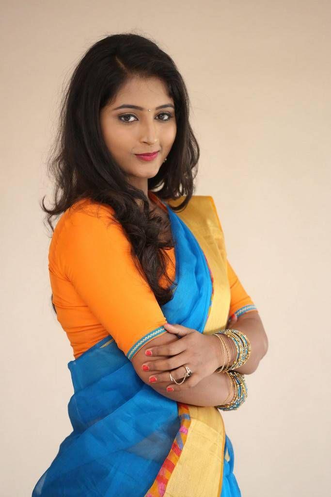 Teja Reddy Photo Shoot Stills In Blue Saree With Golden Yellow Border