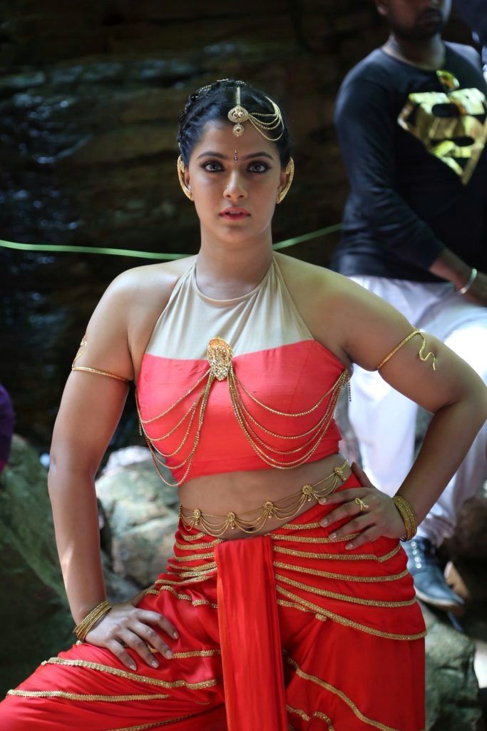 Varalaxmi Hot Stills from Neeyaa 2 Movie