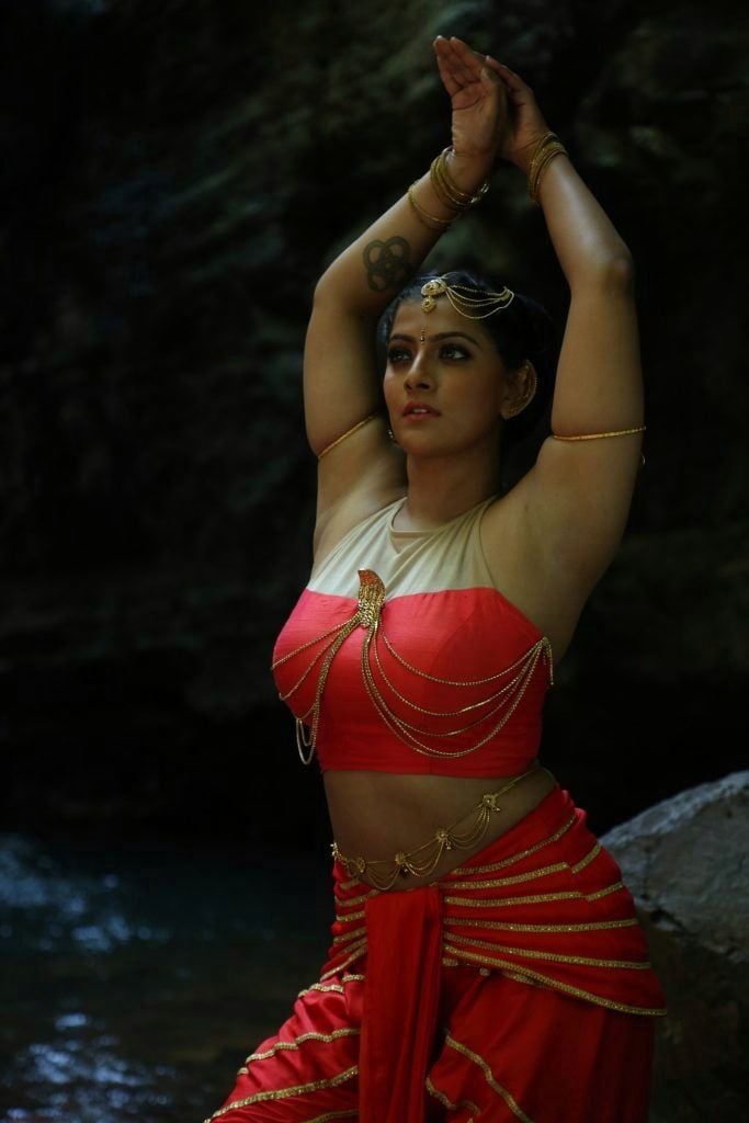 Varalaxmi Hot Stills from Neeyaa 2 Movie