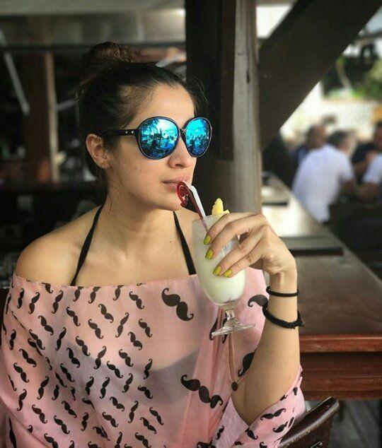 Actress Lakshmi Rai enjoying the holiday vacation in Beach Photos