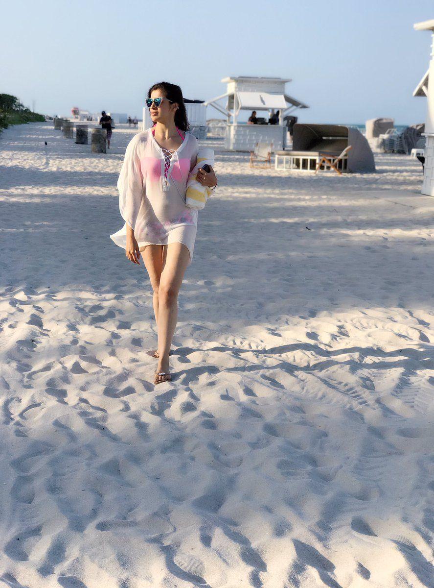 Actress Lakshmi Rai enjoying the holiday vacation in Beach Photos