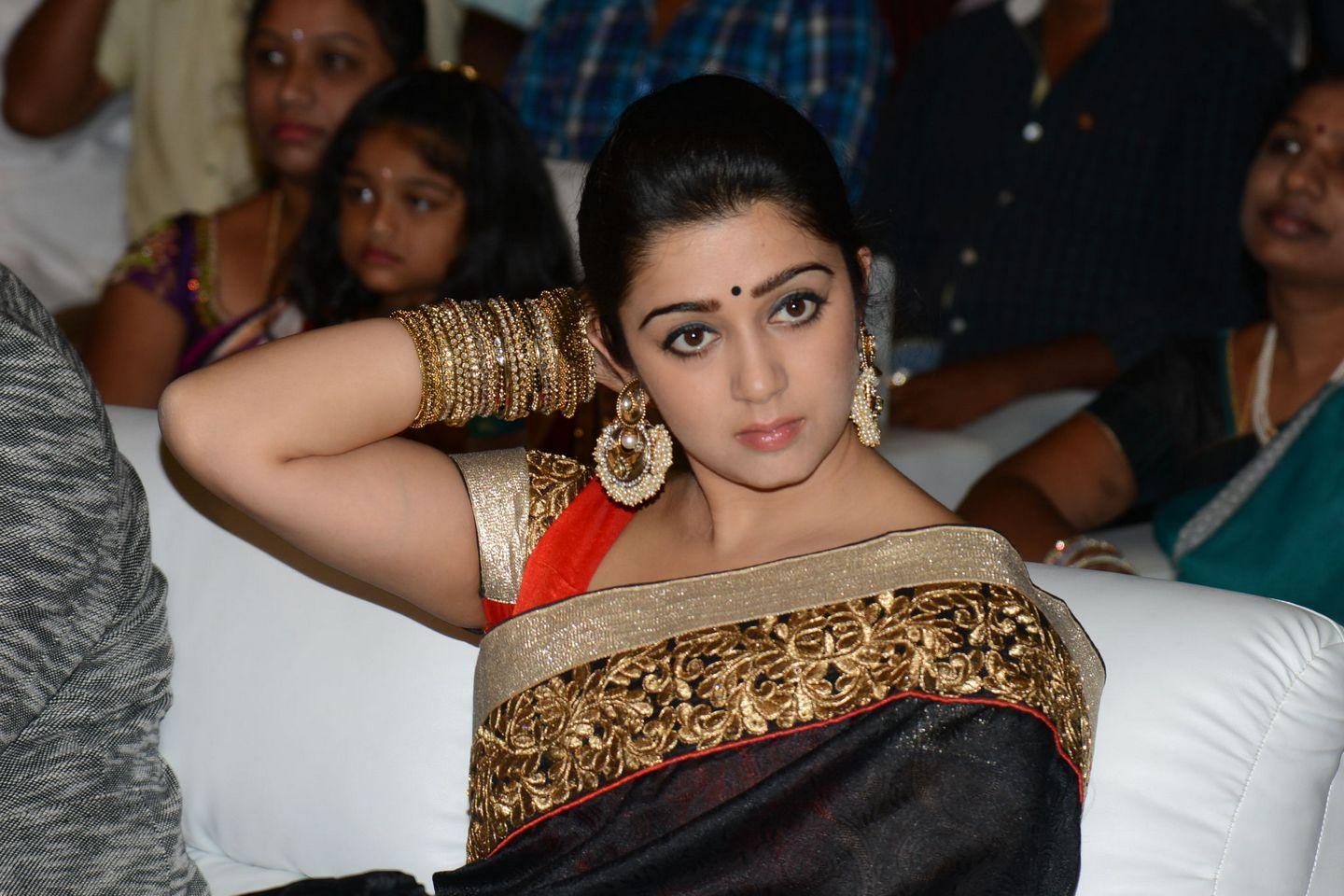 charmy kaur Stills At Jyothi Lakshmi Audio Launch Pics