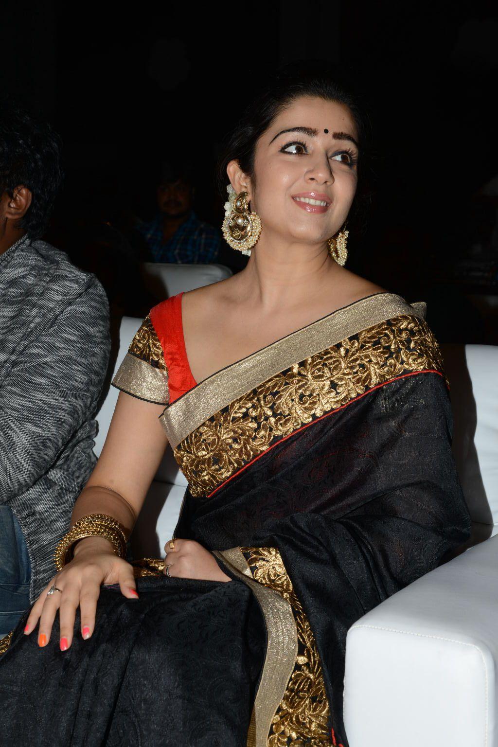 charmy kaur Stills At Jyothi Lakshmi Audio Launch Pics