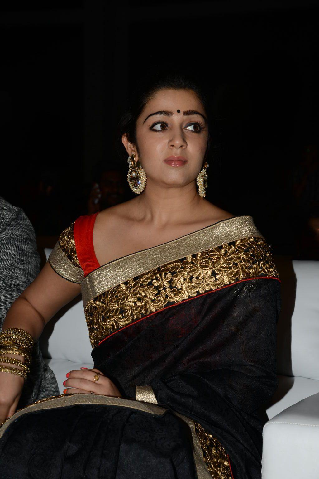 charmy kaur Stills At Jyothi Lakshmi Audio Launch Pics