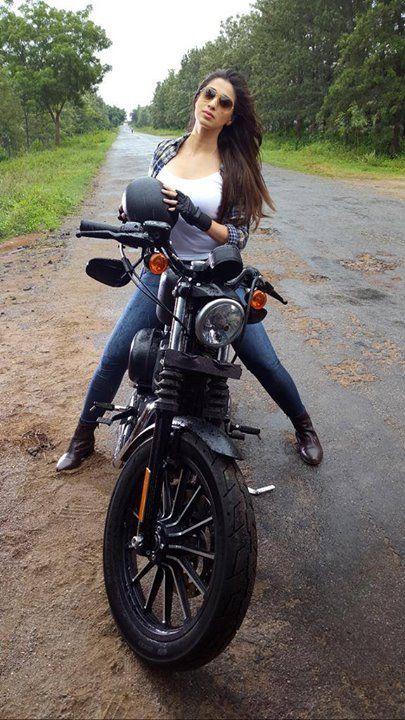 Raai Laxmi Riding Bike Images